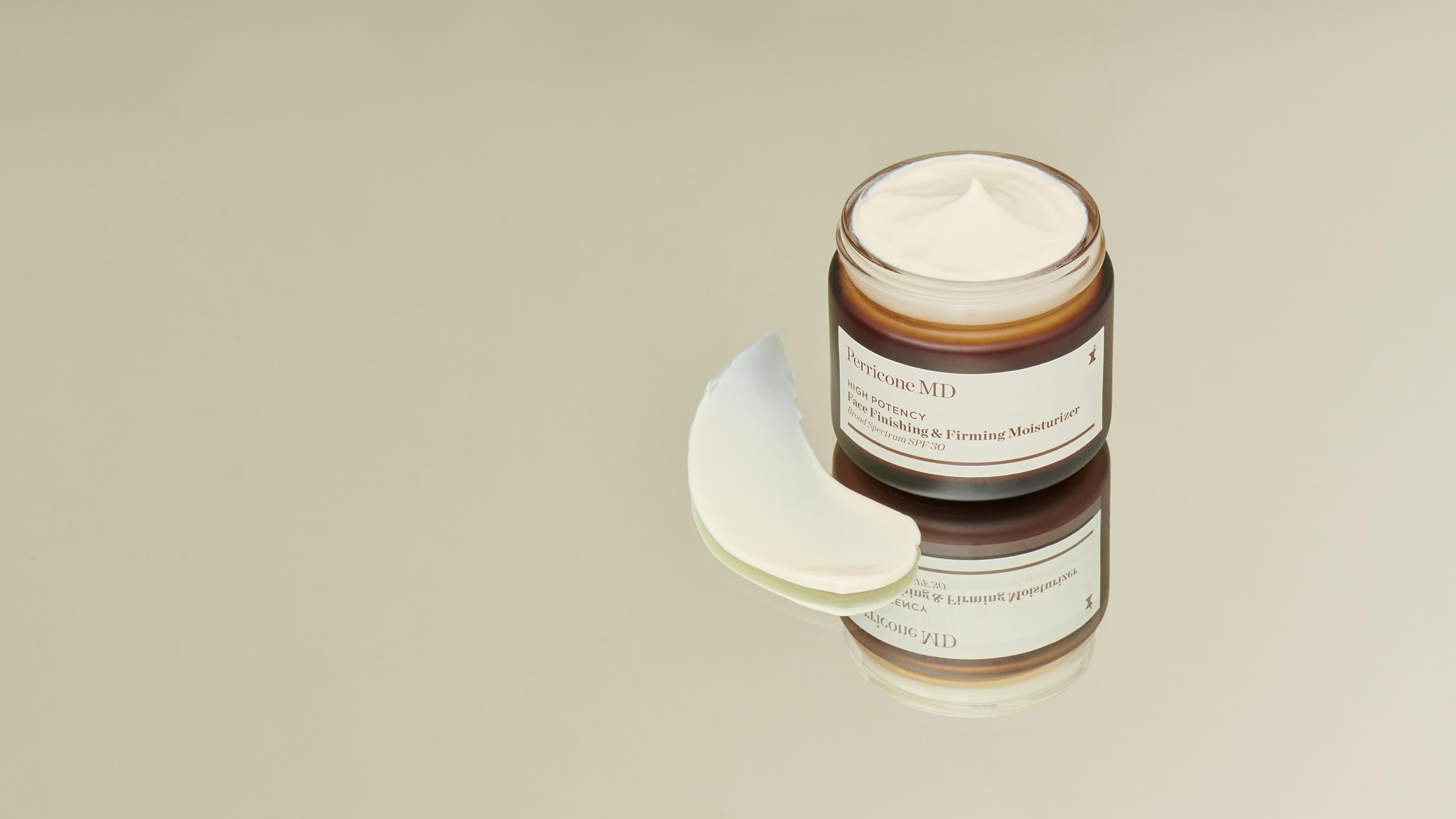 Perricone MD High Potency pump top view emphasizing convenient dispensing and SPF care