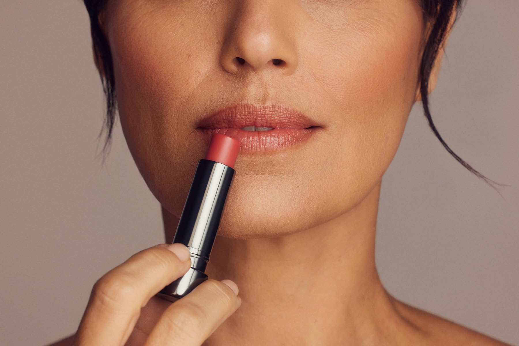 Perricone MD No Makeup Lipstick Original Pink close-up texture with smooth cushiony finish.