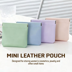 Personalized leather organizer pouch with snap closure, securely closed for travel.