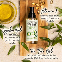 PHARM TO TABLE Tea Tree Hair Oil on scalp massage for calm, healthy-looking results.