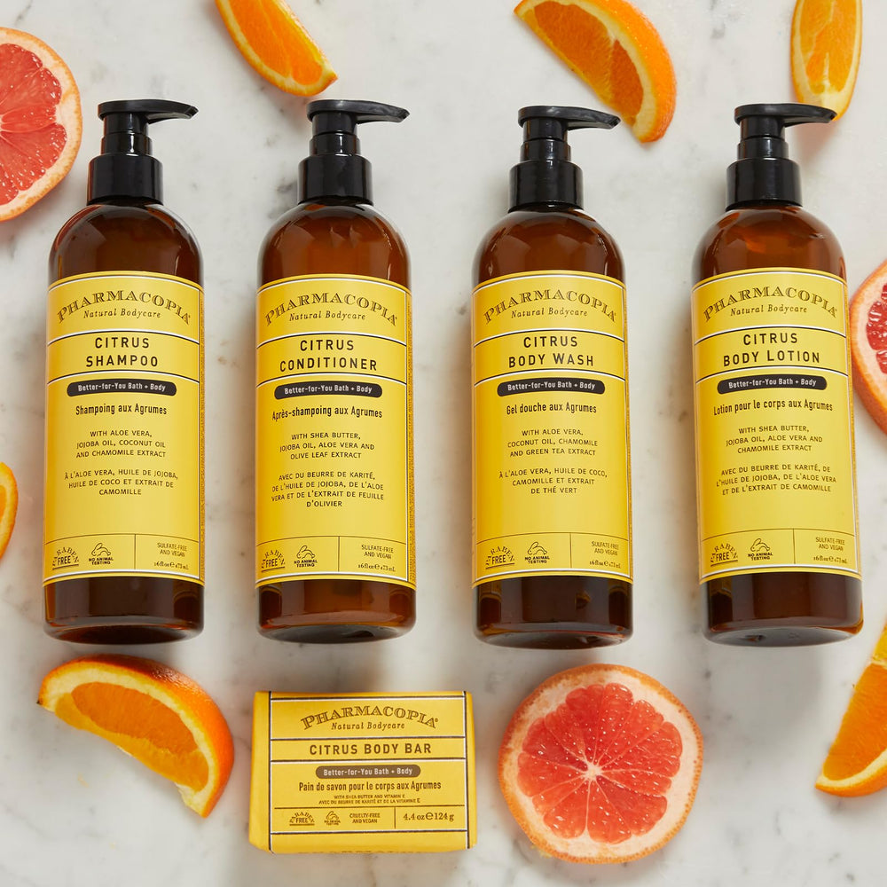 Pharmacopia Citrus Shampoo bathroom vanity suggests daily, gentle cleansing routine.