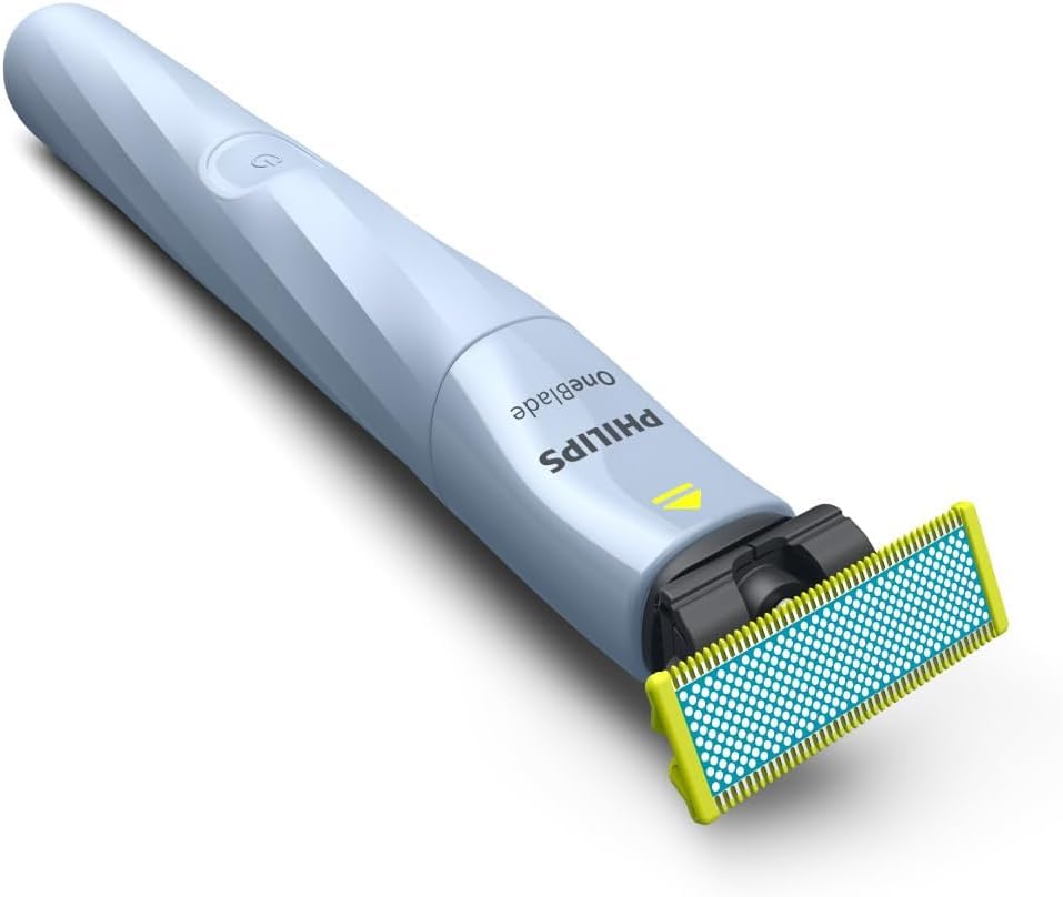 Philips OneBlade First Shave blade close-up emphasizing anti-friction beads for smooth shaving