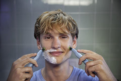 Philips OneBlade First Shave wet-dry use demonstrates versatility in shower or dry shaving
