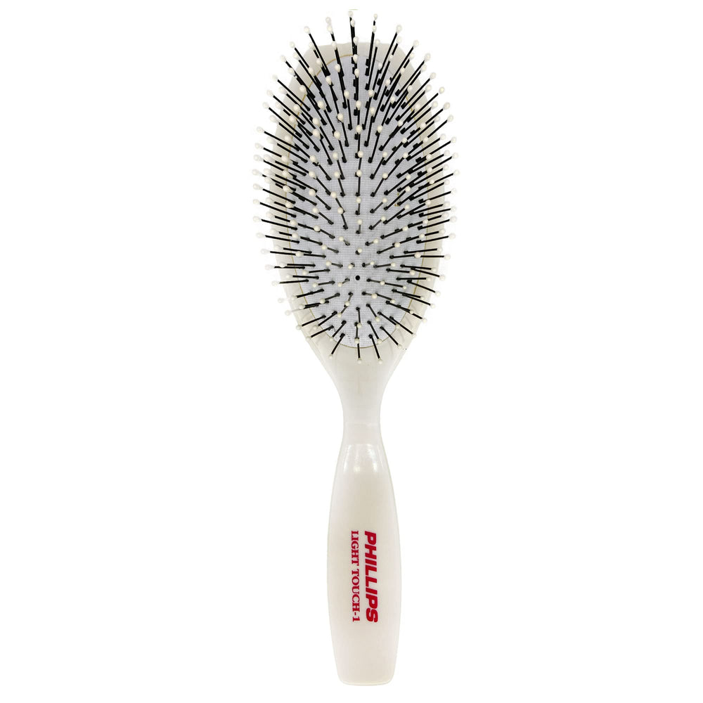 Phillips Brush Co Light Touch oval cushioned brush for gentle detangling.