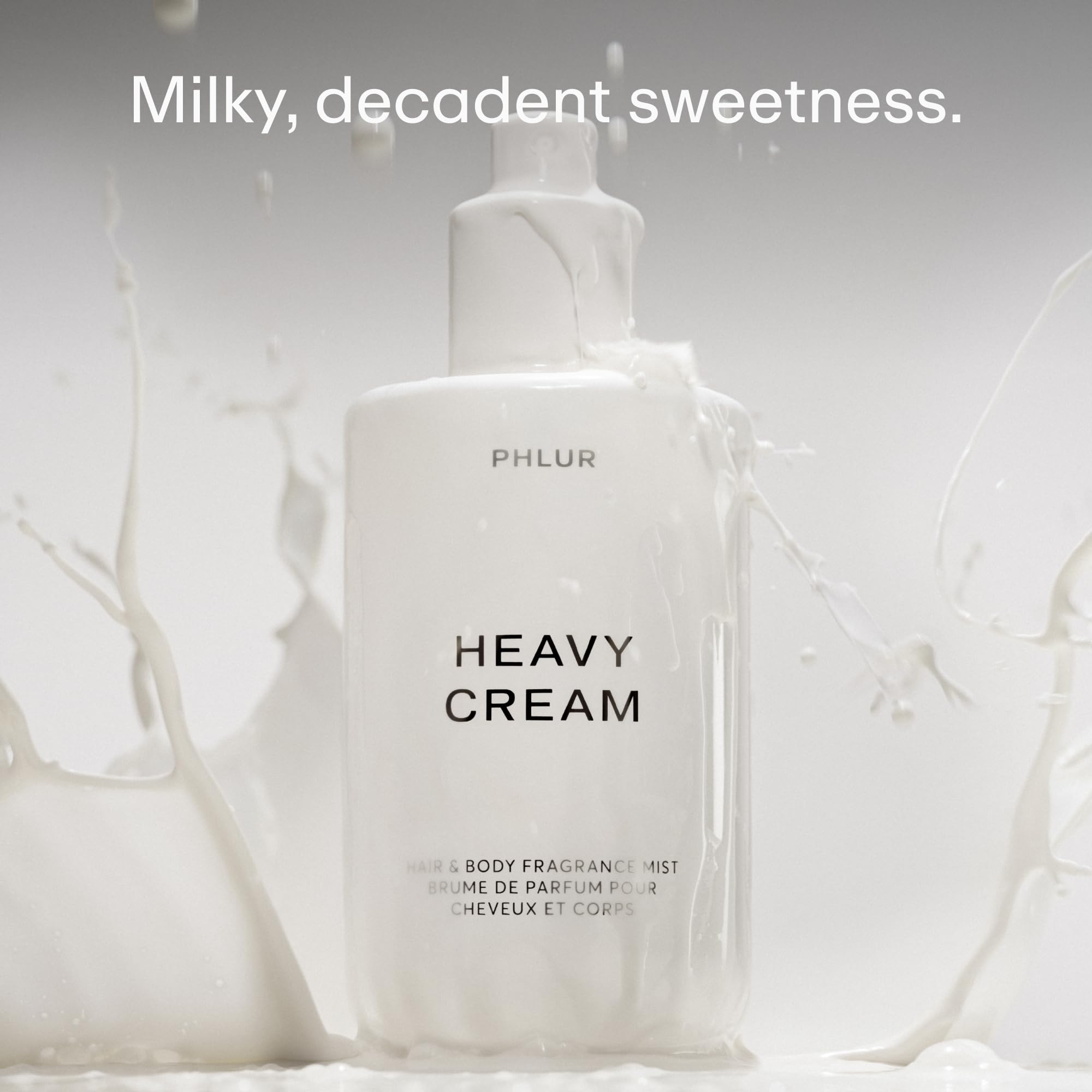 PHLUR Heavy Cream Body Mist swirl highlights marshmallow vanilla vibe for soft notes.