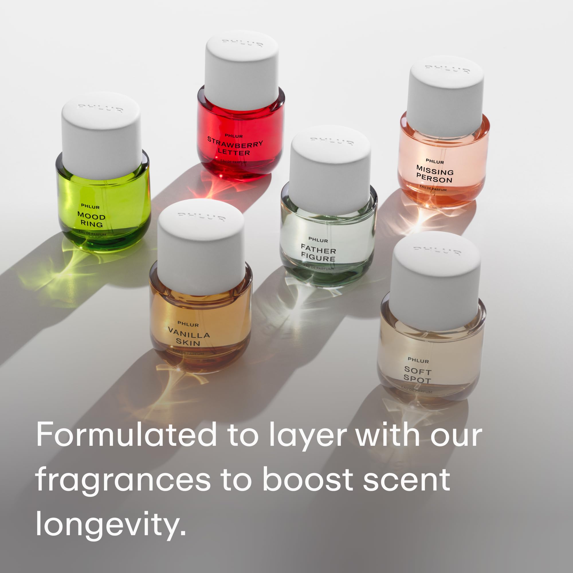 PHLUR Missing Person floral-essence suggests perfume-like layering benefits.