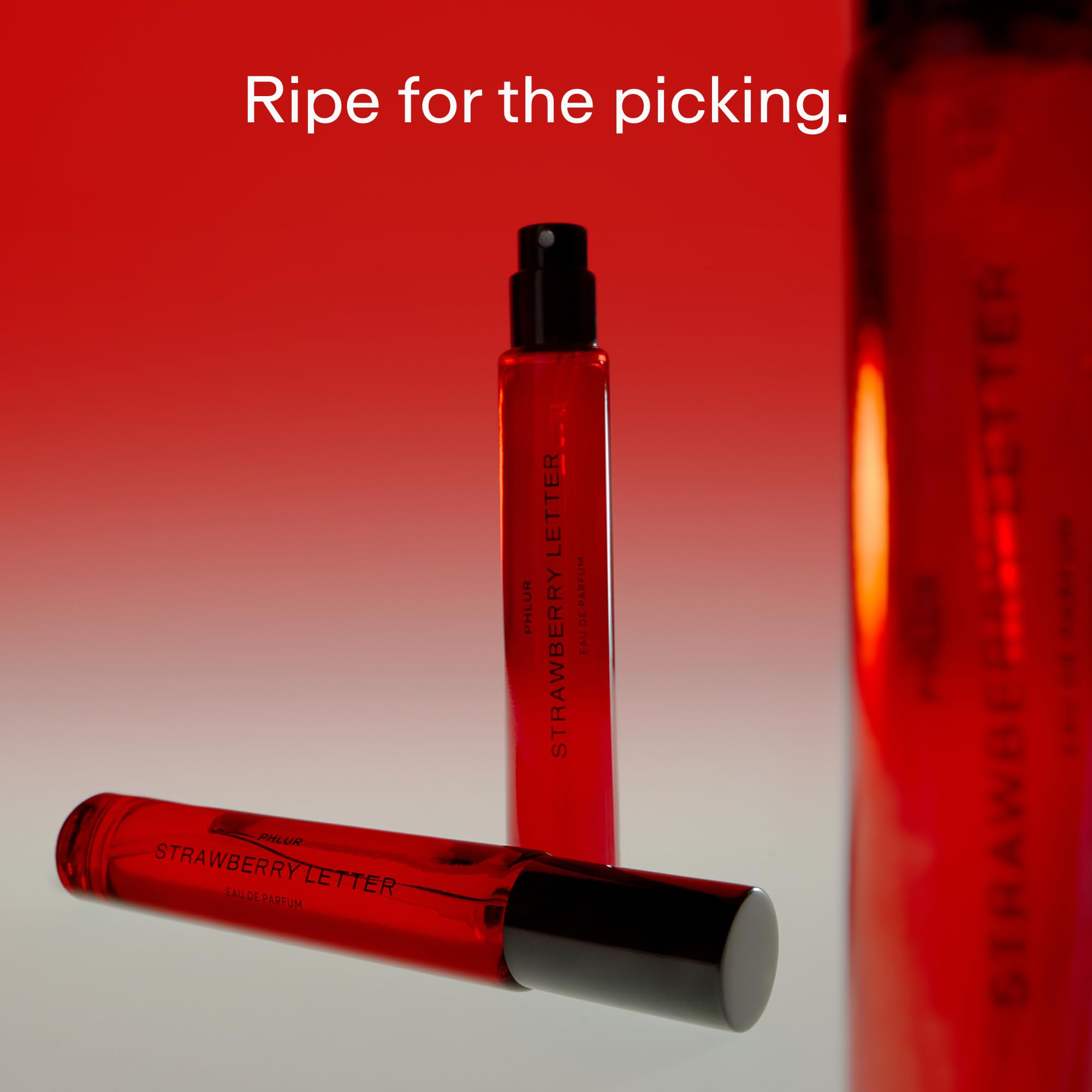 PHLUR Strawberry Letter fragrance spray, easy application for daytime glamour.