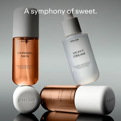 PHLUR Sweet Skin Heavy Cream bottle closeup emphasizing marshmallow sweetness and comfort