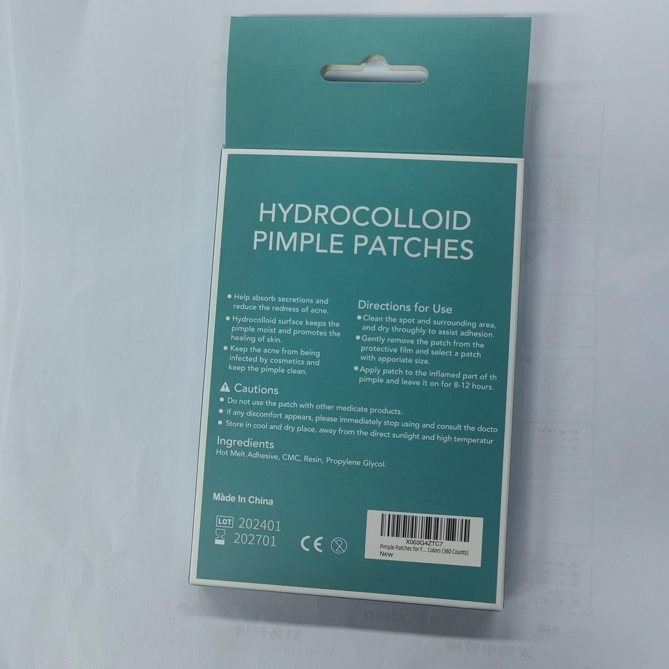 PICcircuit pimple patches protecting a blemish from dirt overnight.