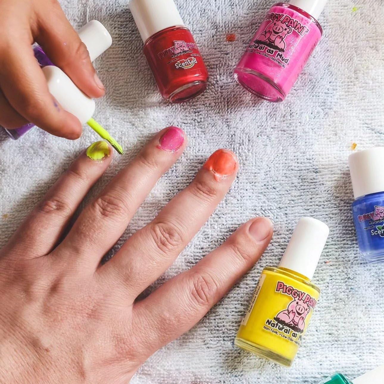 Piggy Paint Bae-Bee Bliss topcoat adding shine and protection