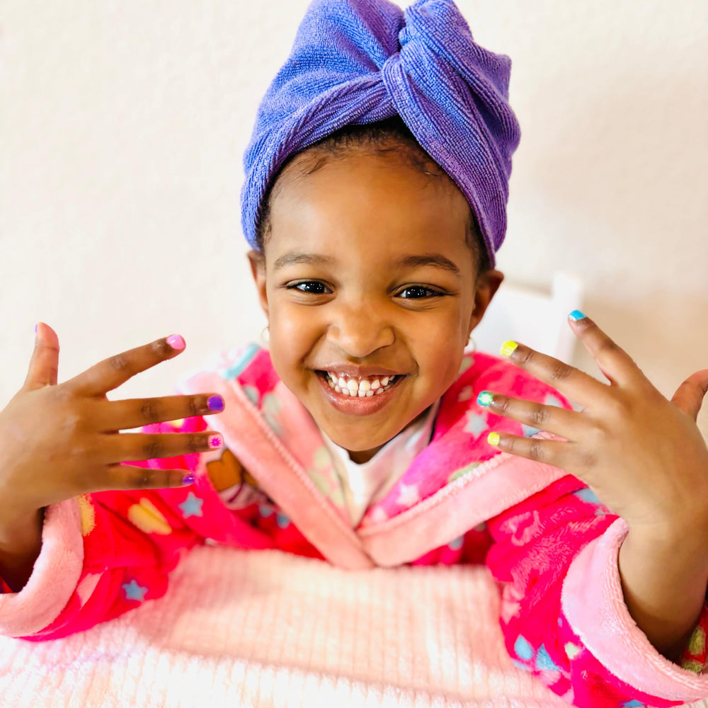 Family-friendly manicure moment with Sea-quin in cozy home setting.