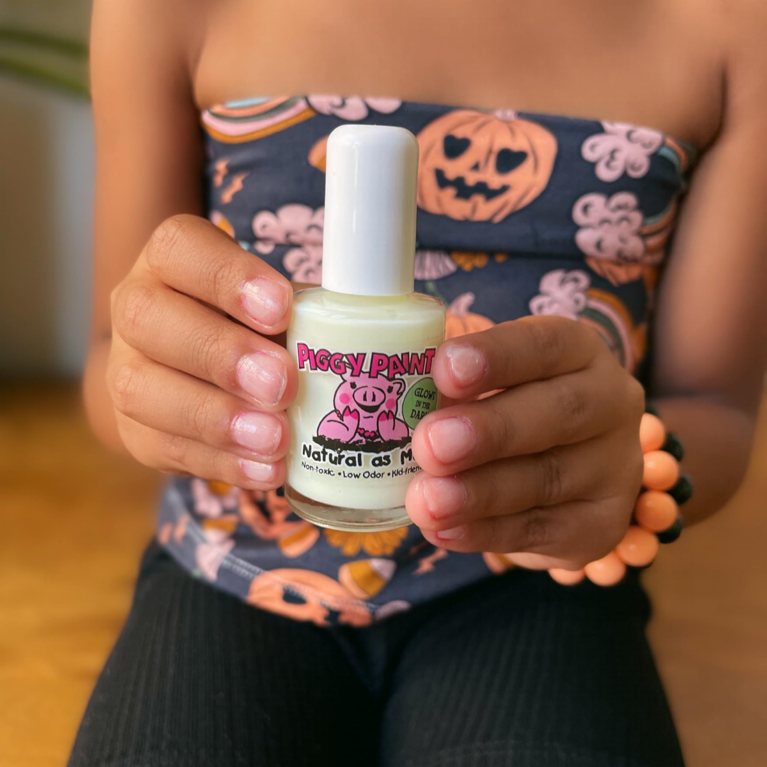 Piggy Paint glow manicure at a sleepover, magical glow for parties and play.