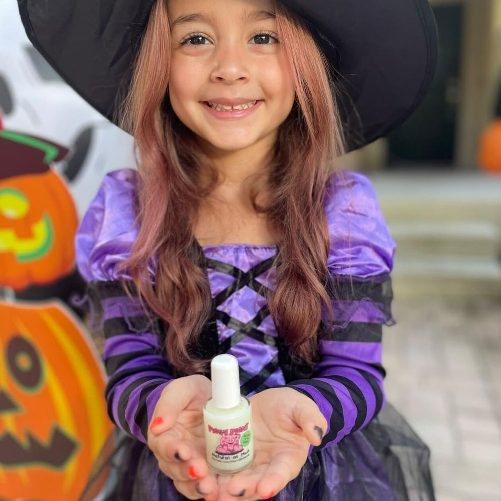 Piggy Paint glow during a night party, safe fun for kids' nails.