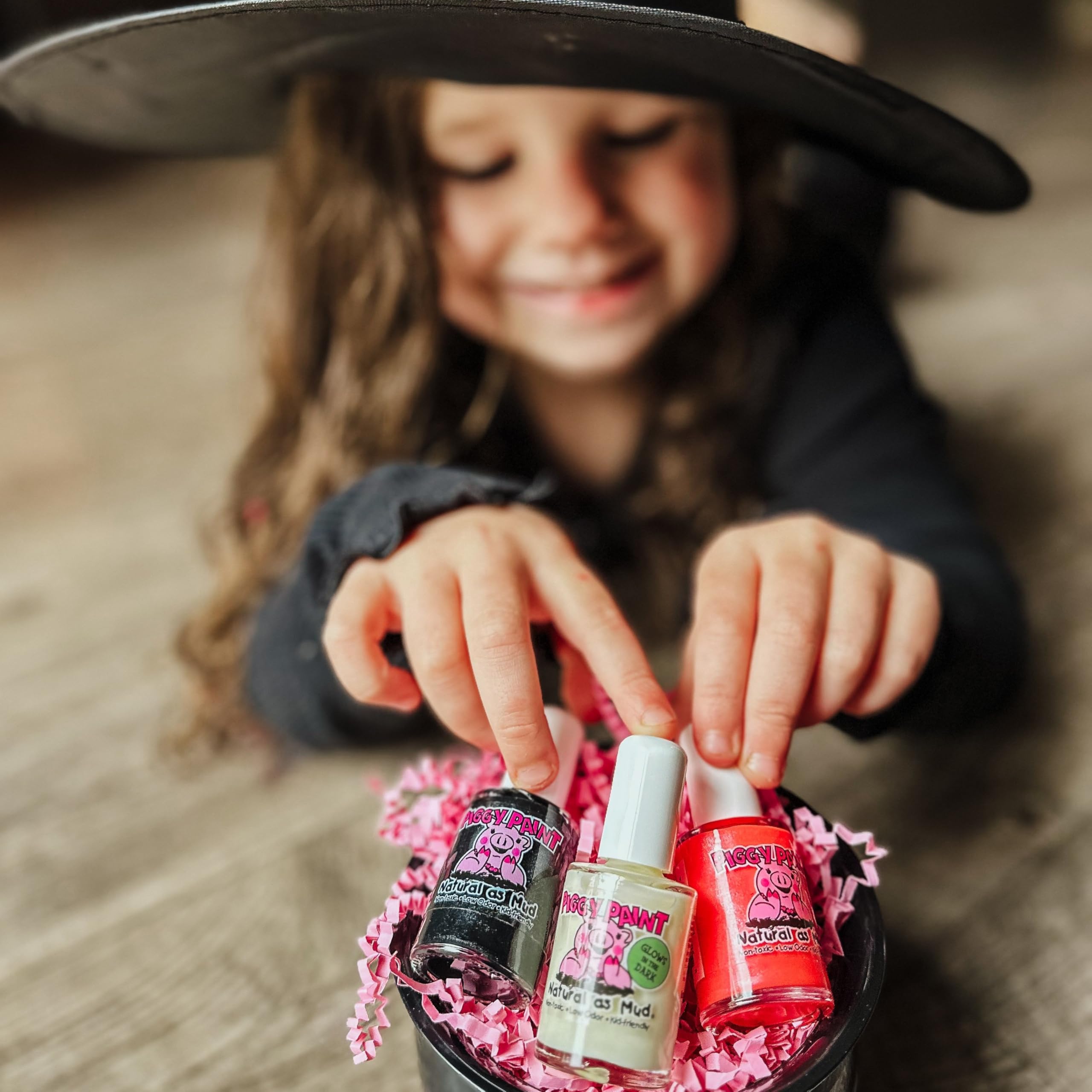 Piggy Paint odorless water-based formula shown for comfortable use.