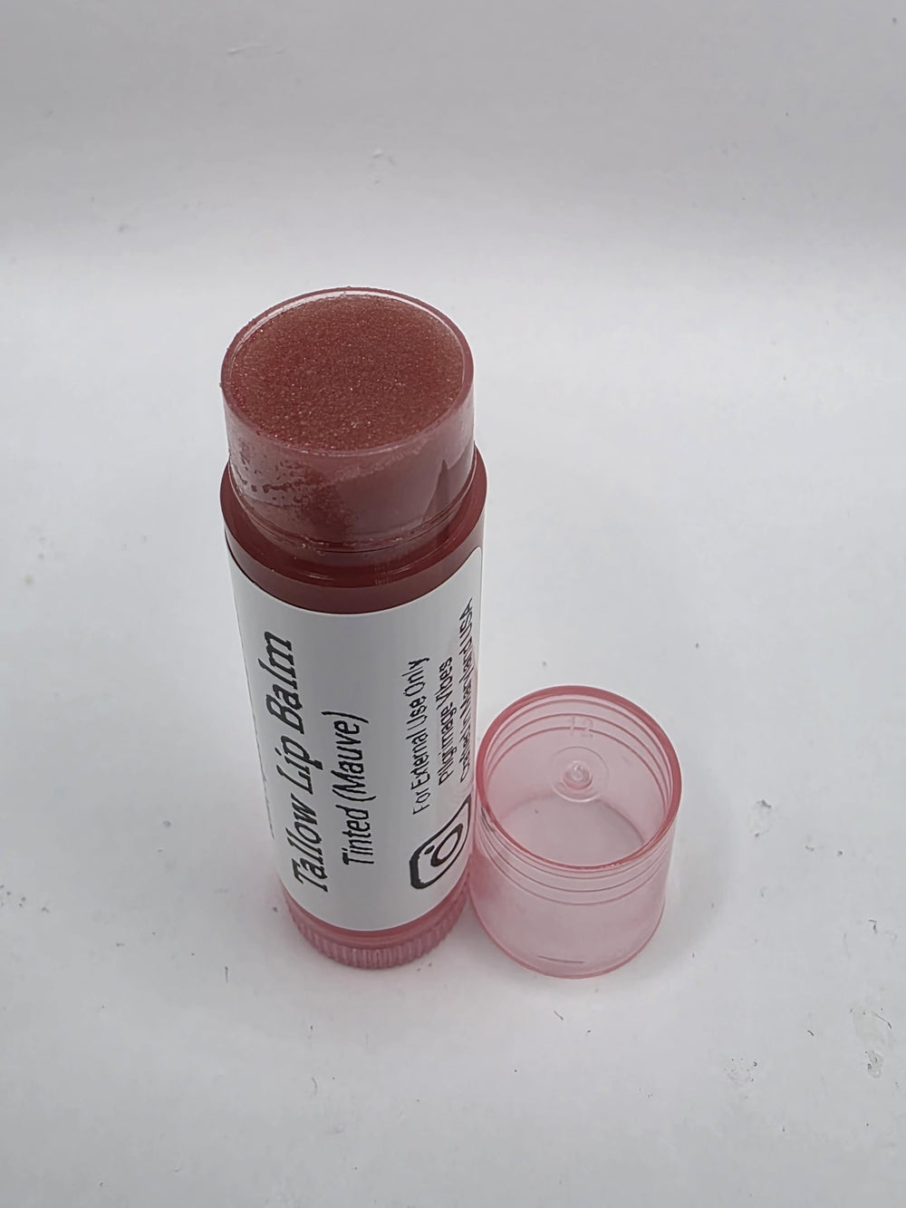 Pilgrimage Vibes tinted mauve swatch demonstrates subtle daily color.
