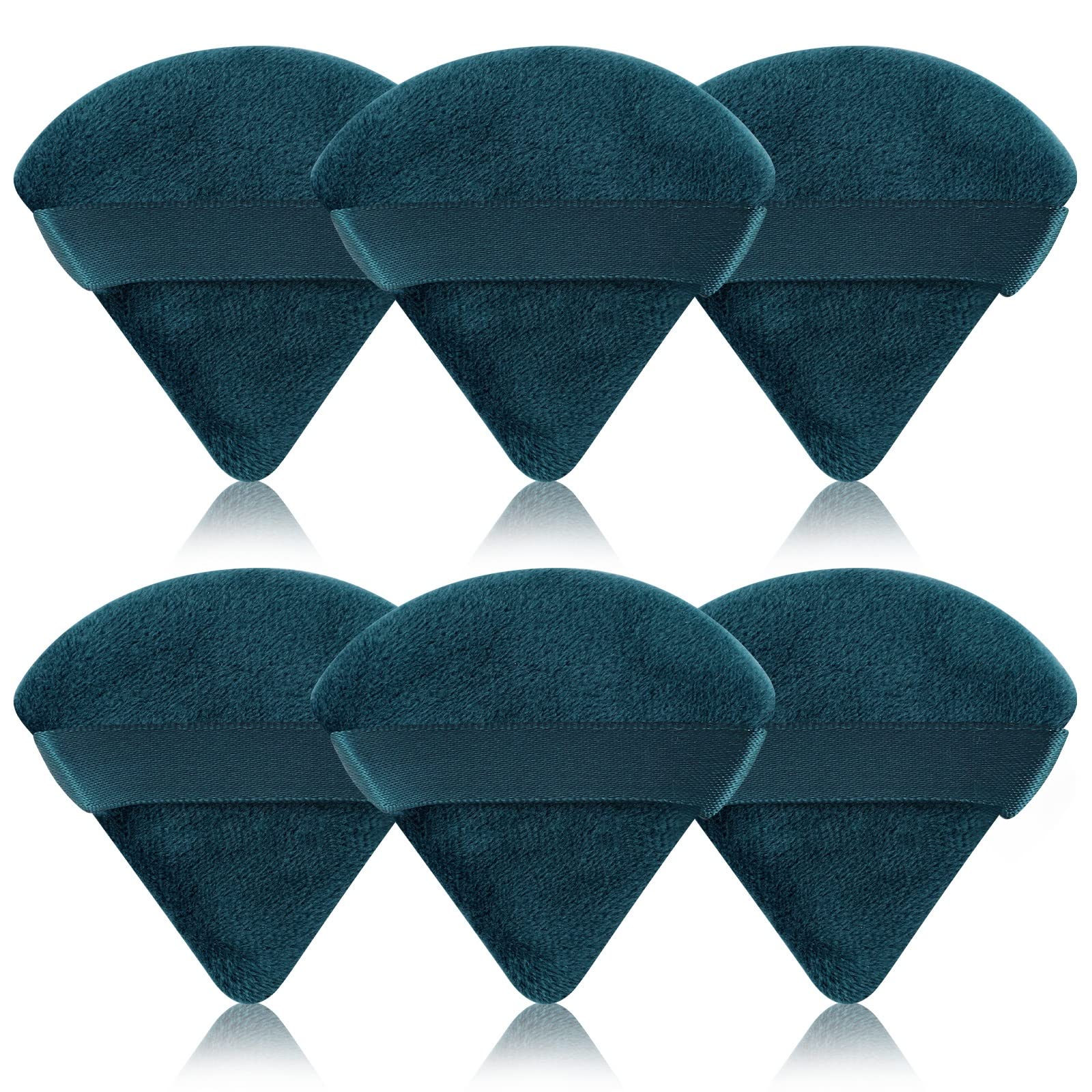 Pimoys powder puff triangle-round application for precise foundation and contour.