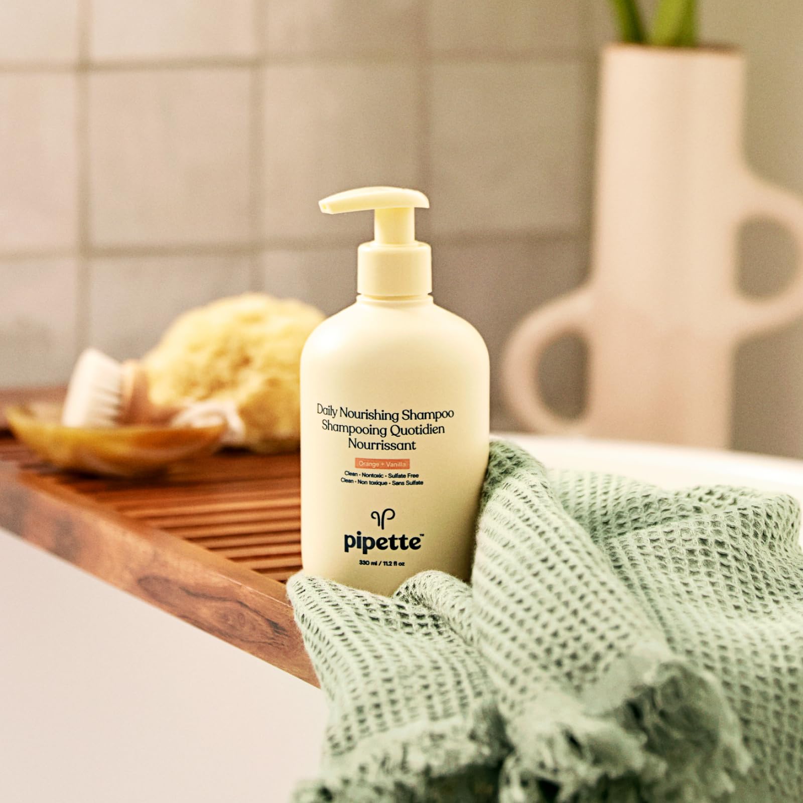 Pipette Nourishing Conditioner bottle detangles and smooths strands.