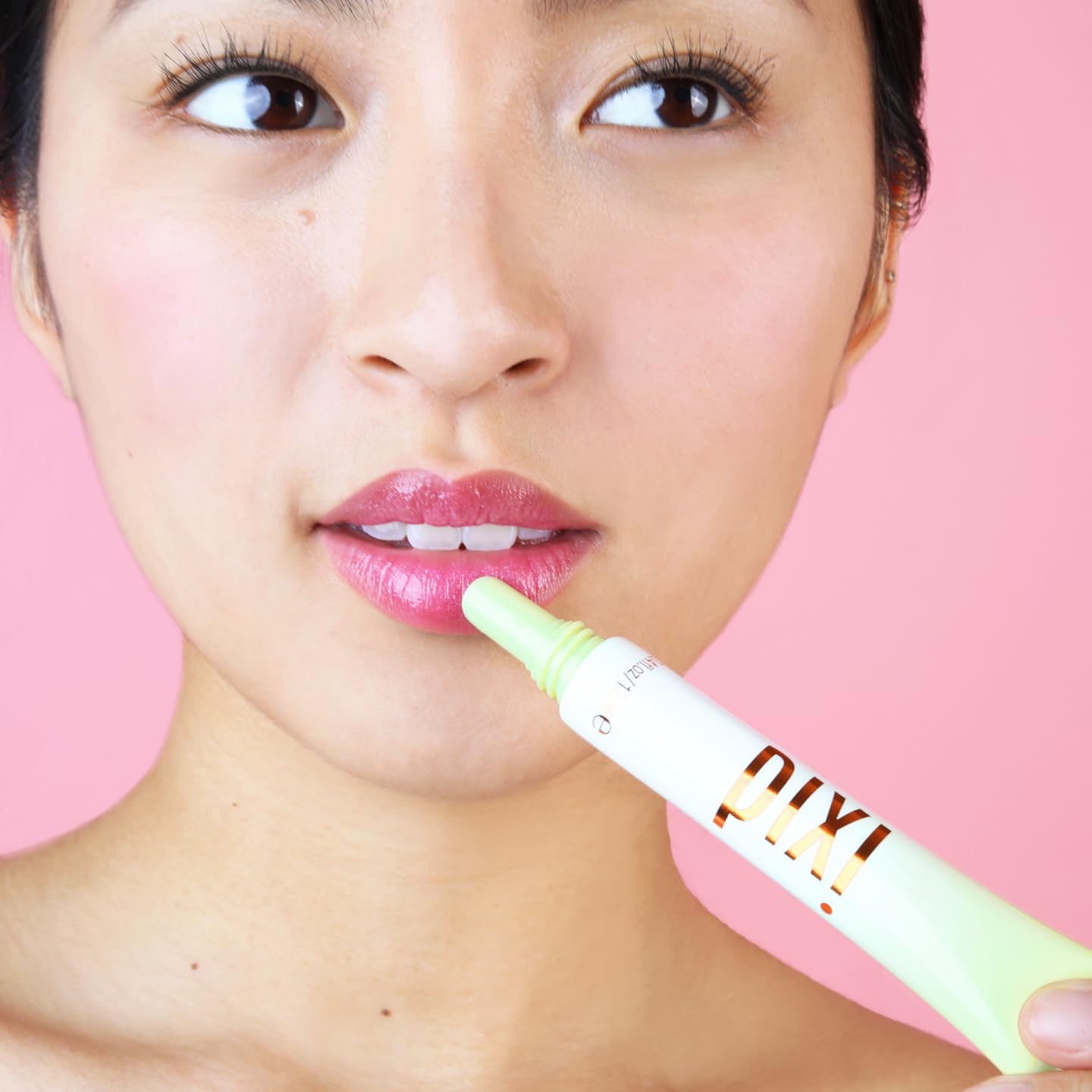 Pixi LipTone Peachyness worn in daily look for natural shine.