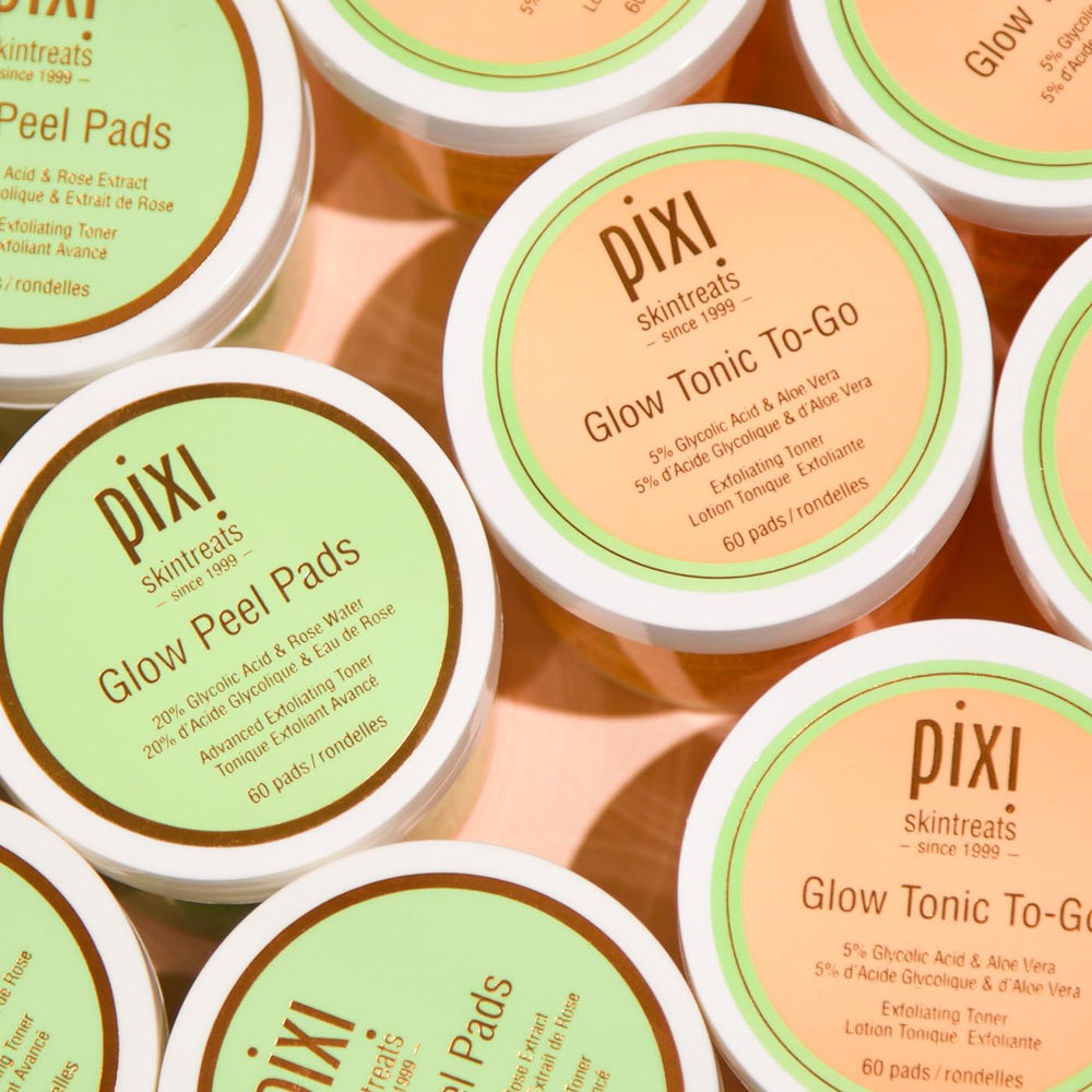 Pixi Glow Tonic to-Go applying pad on face for gentle exfoliation and glow.