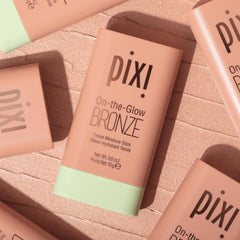 Pixi On-the-Glow Bronze stick swatch demonstrates seamless blend and natural bronze tint.