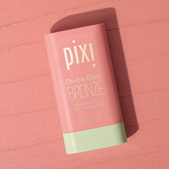Pixi On-the-Glow Bronze WarmGlow swatch on cheek for sun-kissed glow.