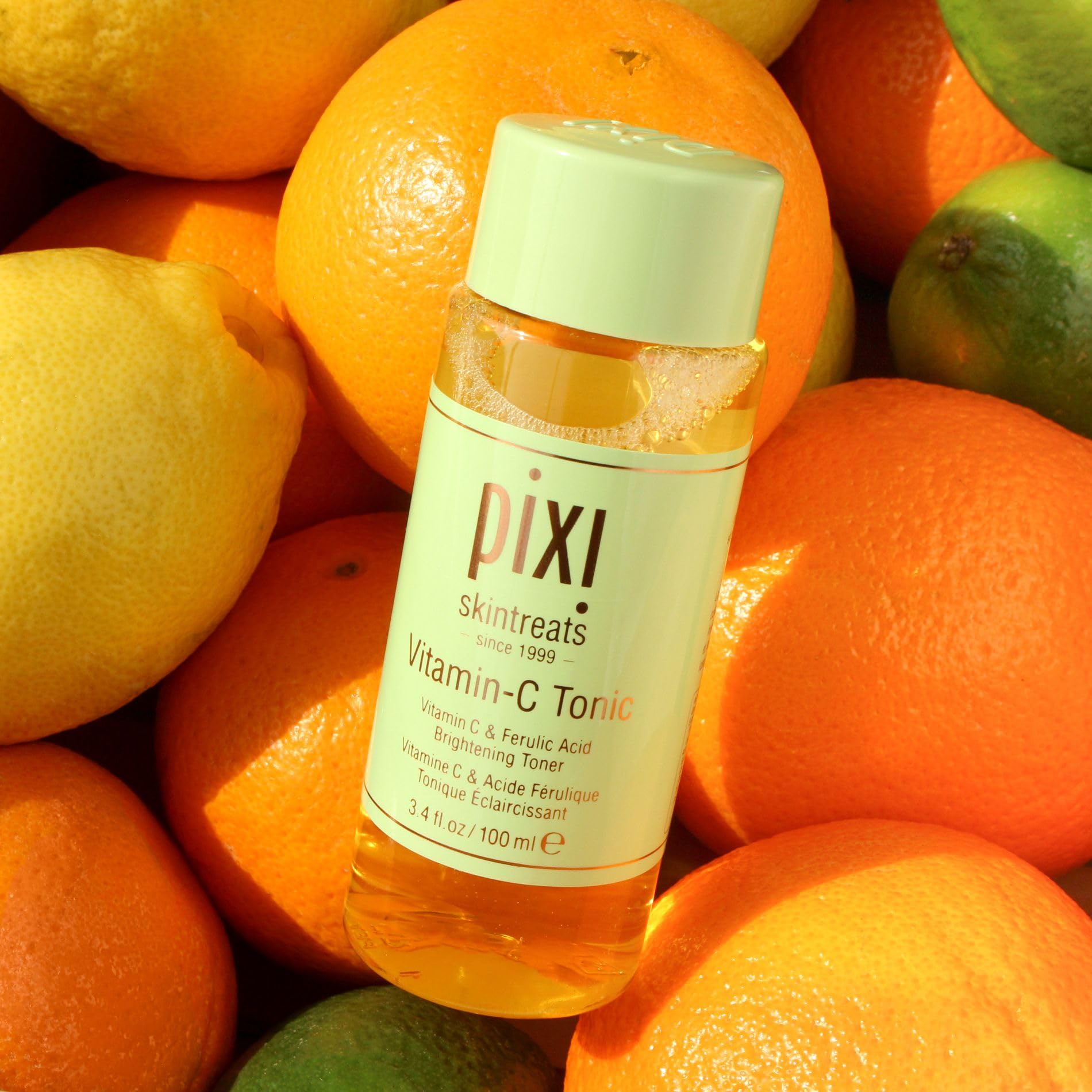 Pixi Vitamin-C Tonic travel-size bottle ready for on-the-go skincare.
