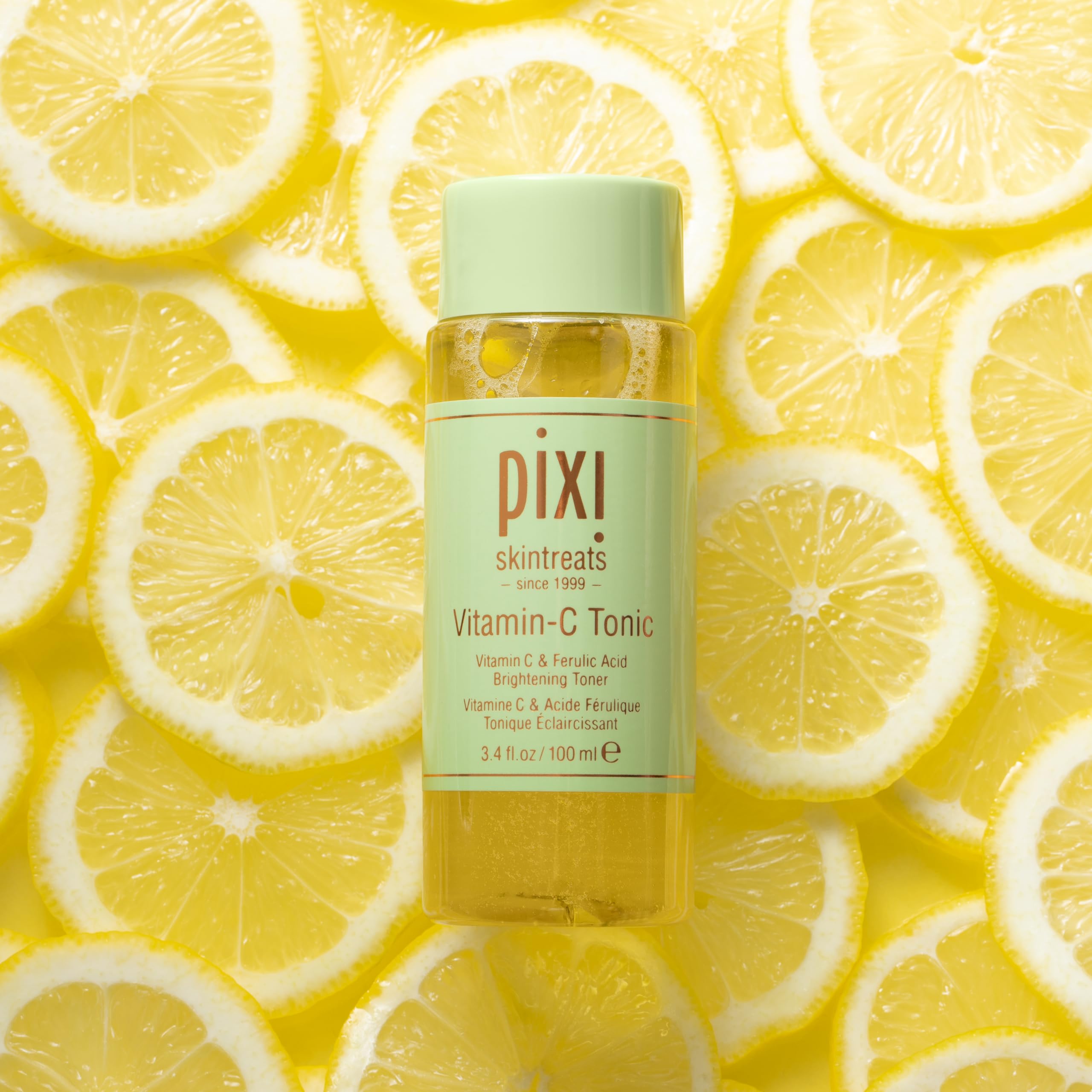Pixi Vitamin-C Tonic citrus imagery hints gentle exfoliation with willow bark balance.