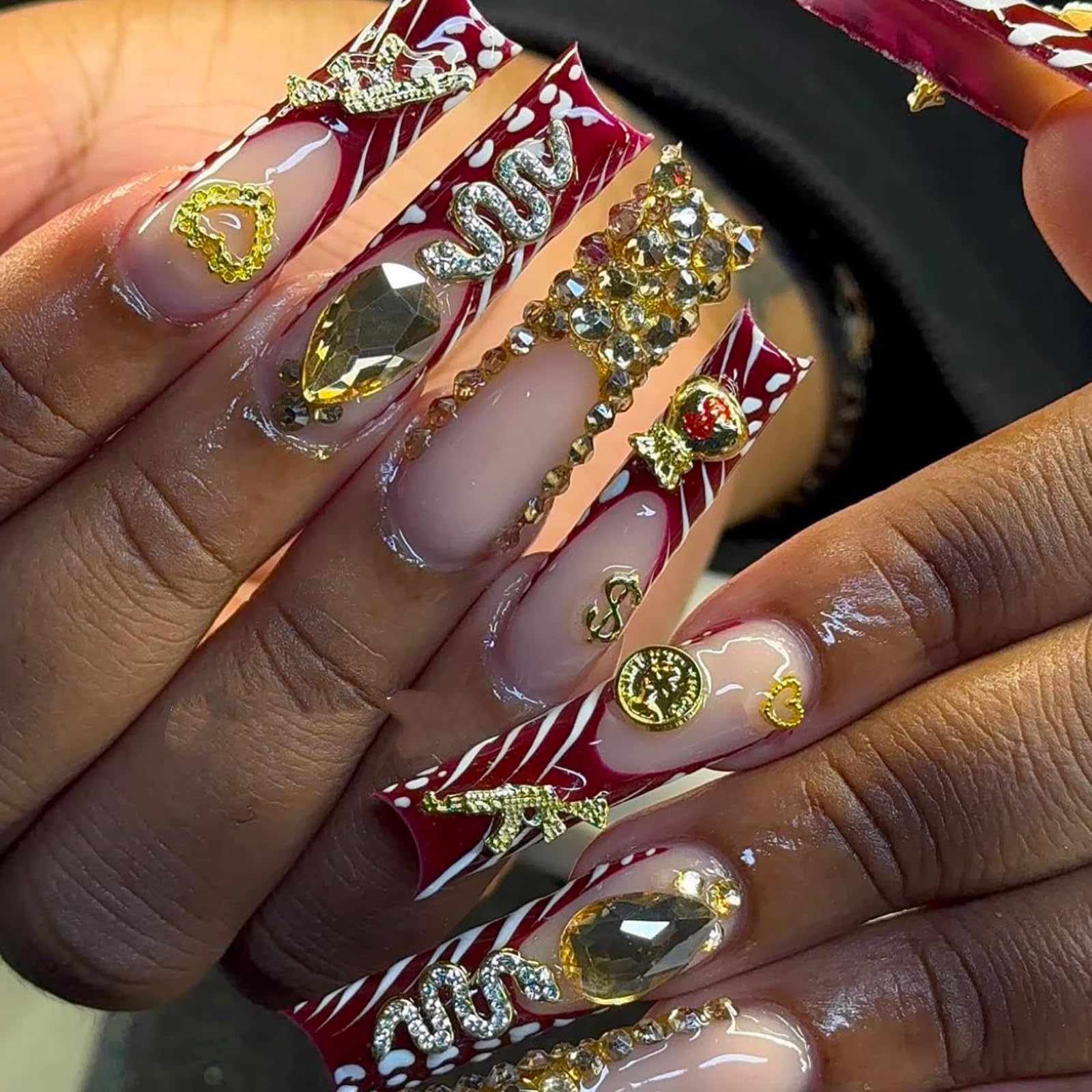 Pizadix gold nail charms with bows offer delicate, feminine flair