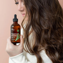 Plant Therapy rosemary-oil bottle with herbal aroma supports refreshing scalp routine.