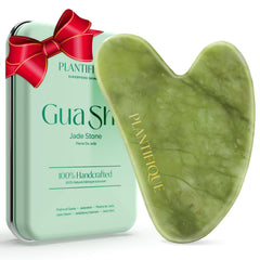 Plantifique Gua Sha face tool in hand for a smooth spa-like skincare routine