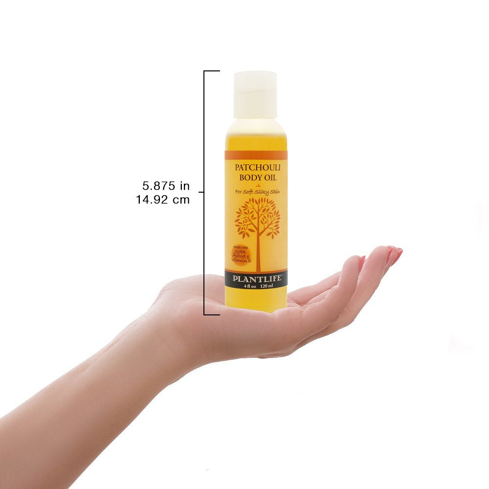 Plantlife Patchouli Body Oil used during a massage for soothing aroma.