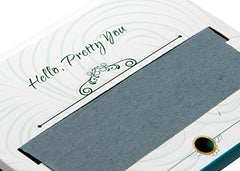 PleasingCare blotting sheets in dispenser offering one-at-a-time access to reduce waste.