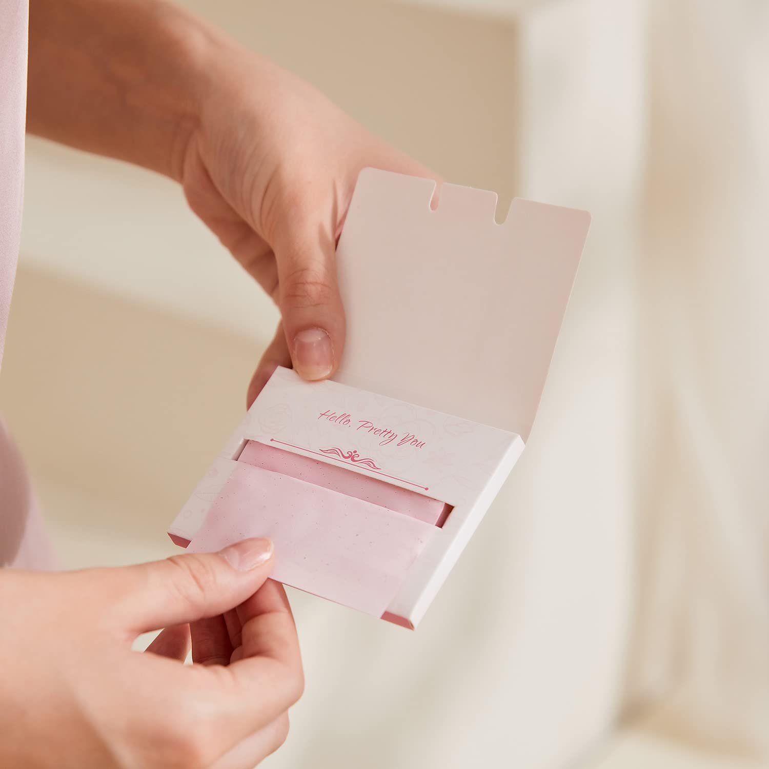 PleasingCare Natural linen blotting sheets with rose offer gentle oil control and freshness.