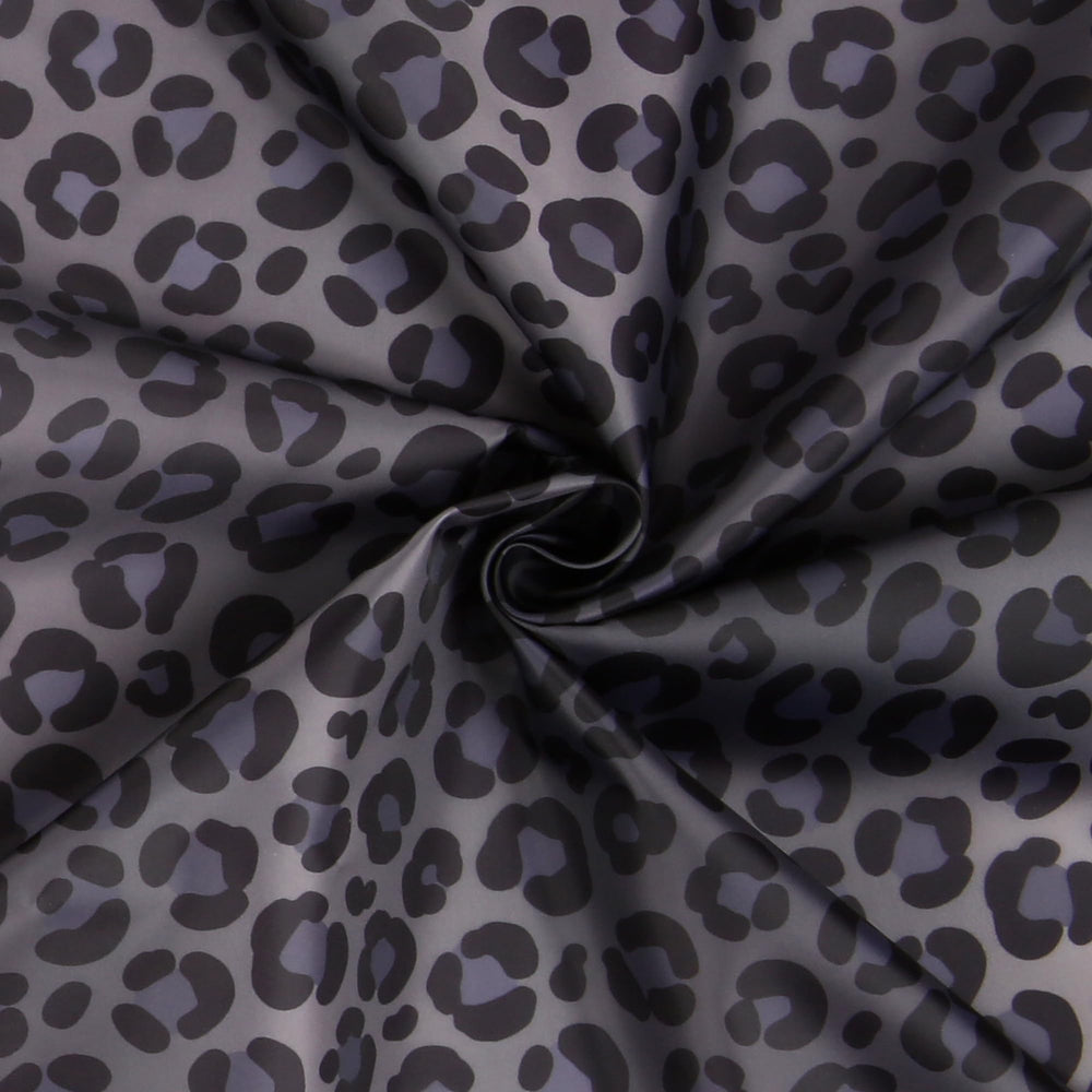 Plum Hill leopard cape used as a thoughtful gift for stylists