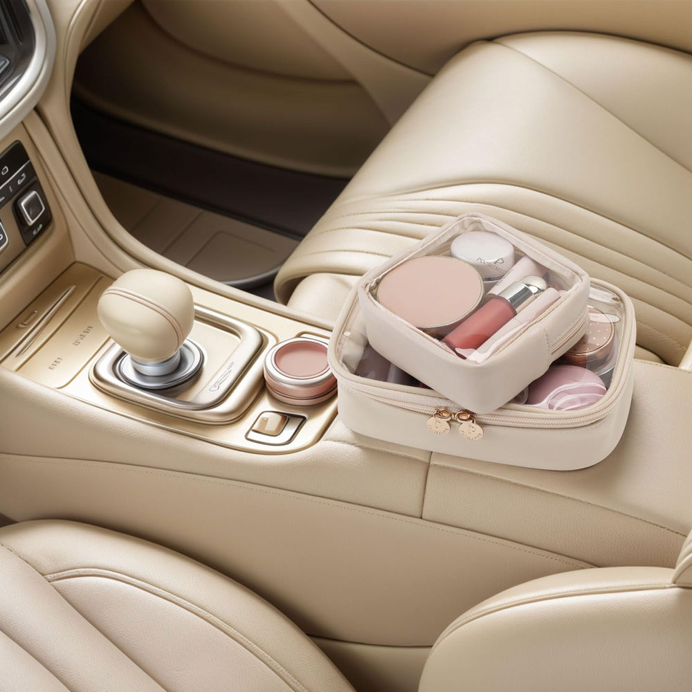 Pocmimut car-friendly makeup bag in vehicle console for easy beauty access.