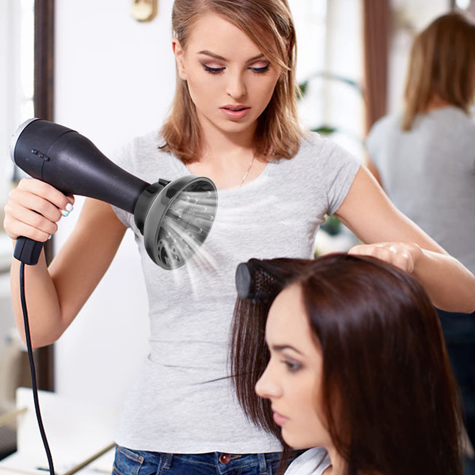 Polly Online diffuser-frizz-control helps smooth blowouts for polished curly looks.