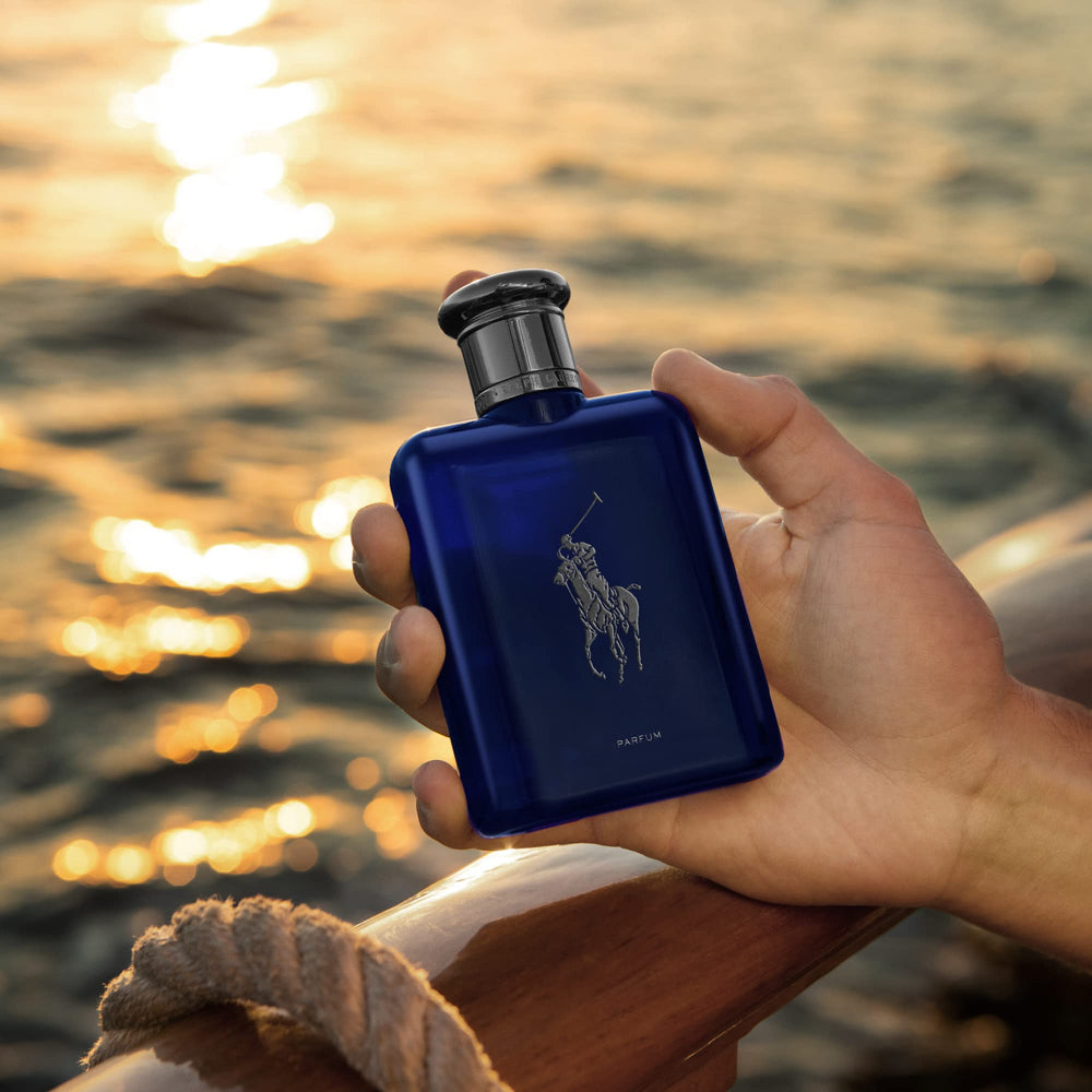 Polo Blue Parfum spray application demonstrates 3-6 inch mist on pulse points.