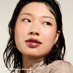 Pound Cake Cake Theory glossy lip application close-up with high shine