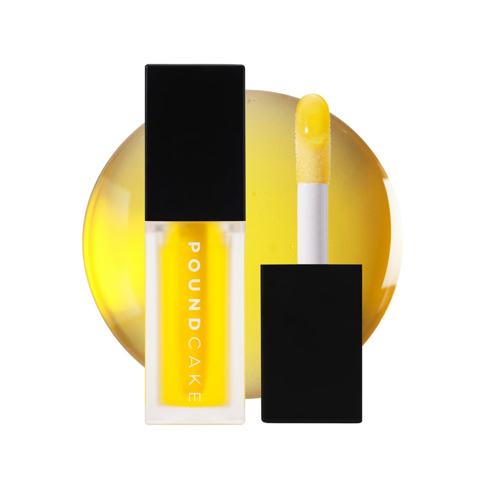 POUND CAKE Cake Theory lip oil bottle—hydrating glow with non-sticky finish.