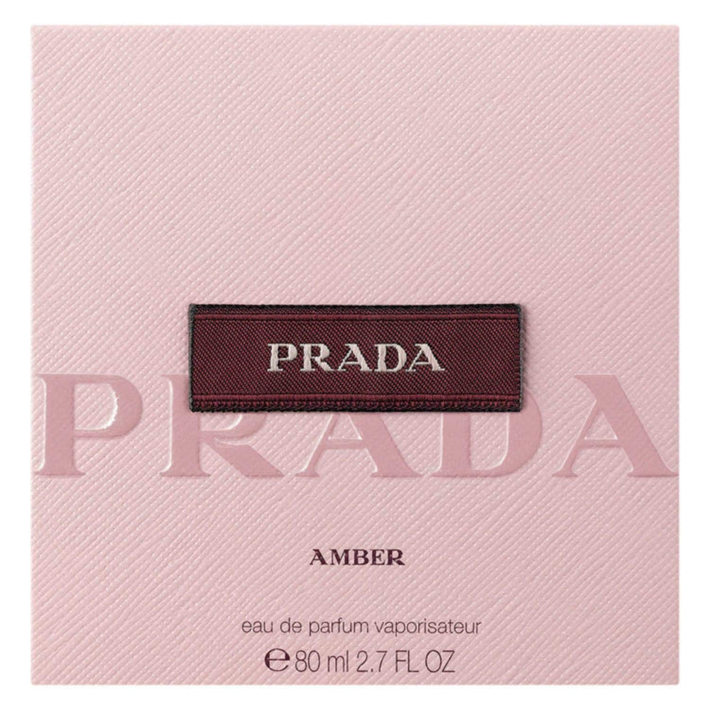 Prada Amber bottle detail reveals metal plaque and refined finish for evening wear