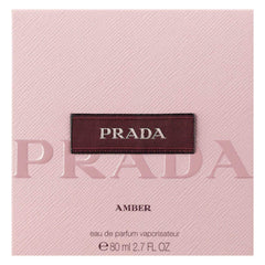 Prada Amber bottle detail reveals metal plaque and refined finish for evening wear