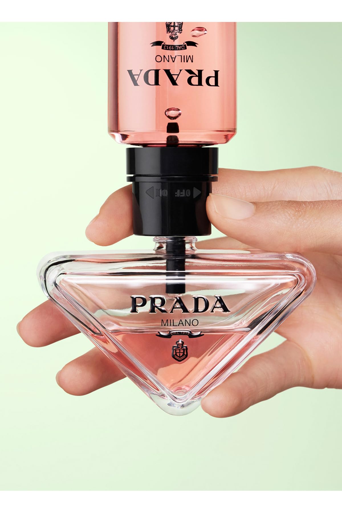 Prada Paradoxe cap open—ease of spray for frequent reapplication.