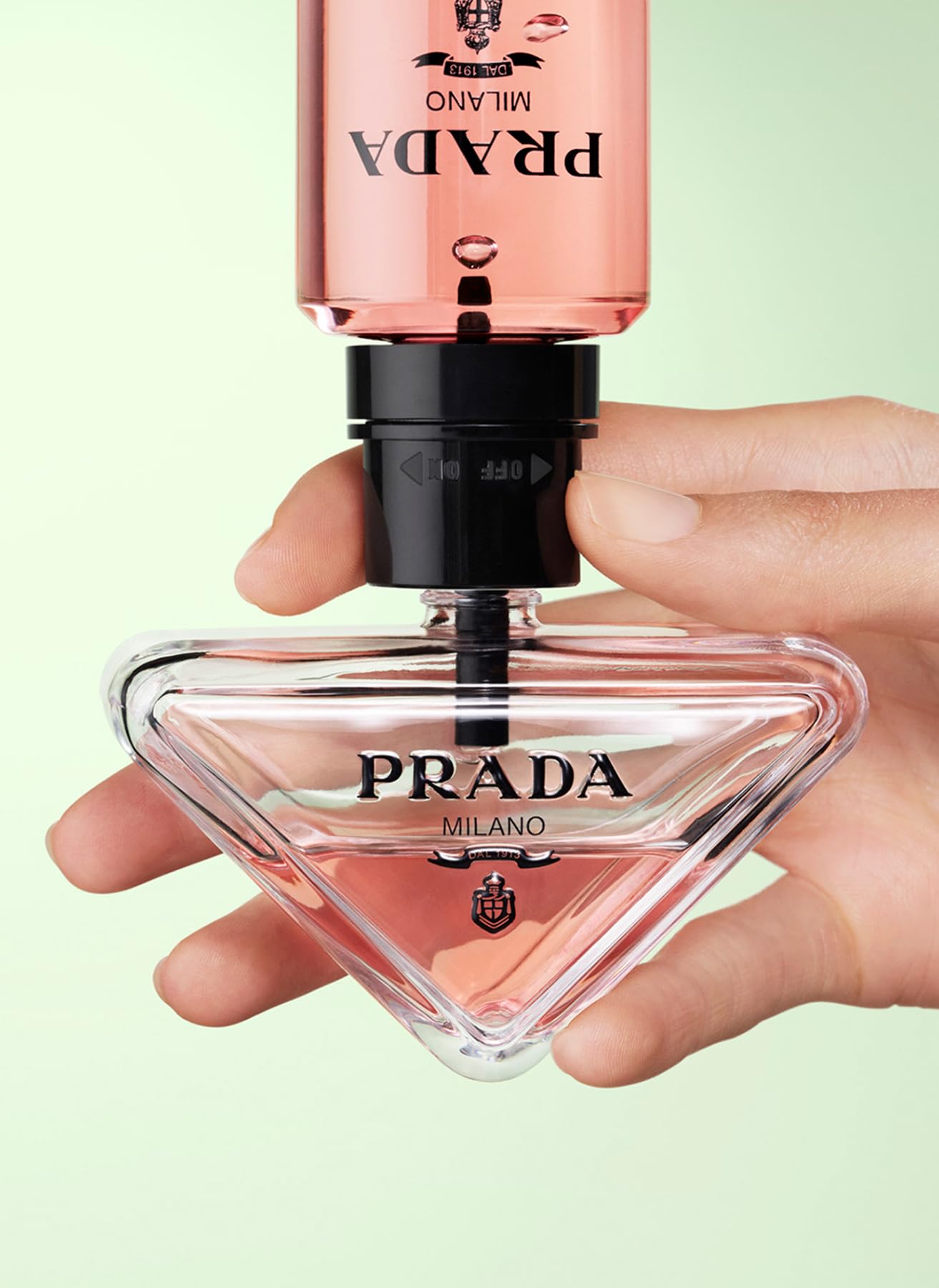 Prada Paradoxe top-notes bottle close-up emphasizes bergamot and neroli freshness.