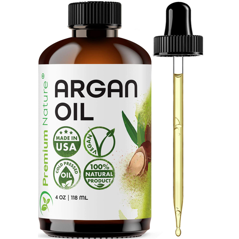 Premium Nature Aceite de Argán, cabello con brillo natural y tacto suave.