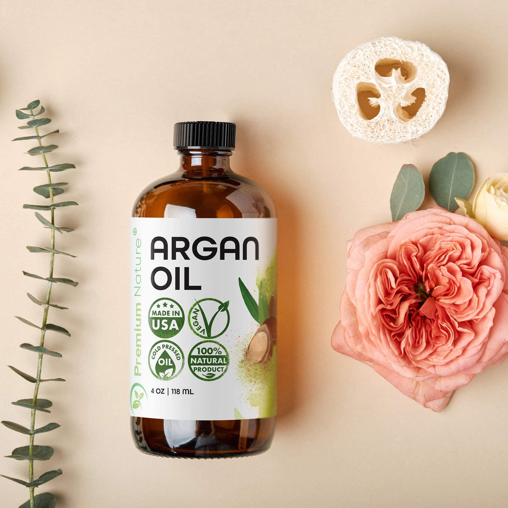 Premium Nature Aceite de Argán, cabello dañado reparado con suavidad.