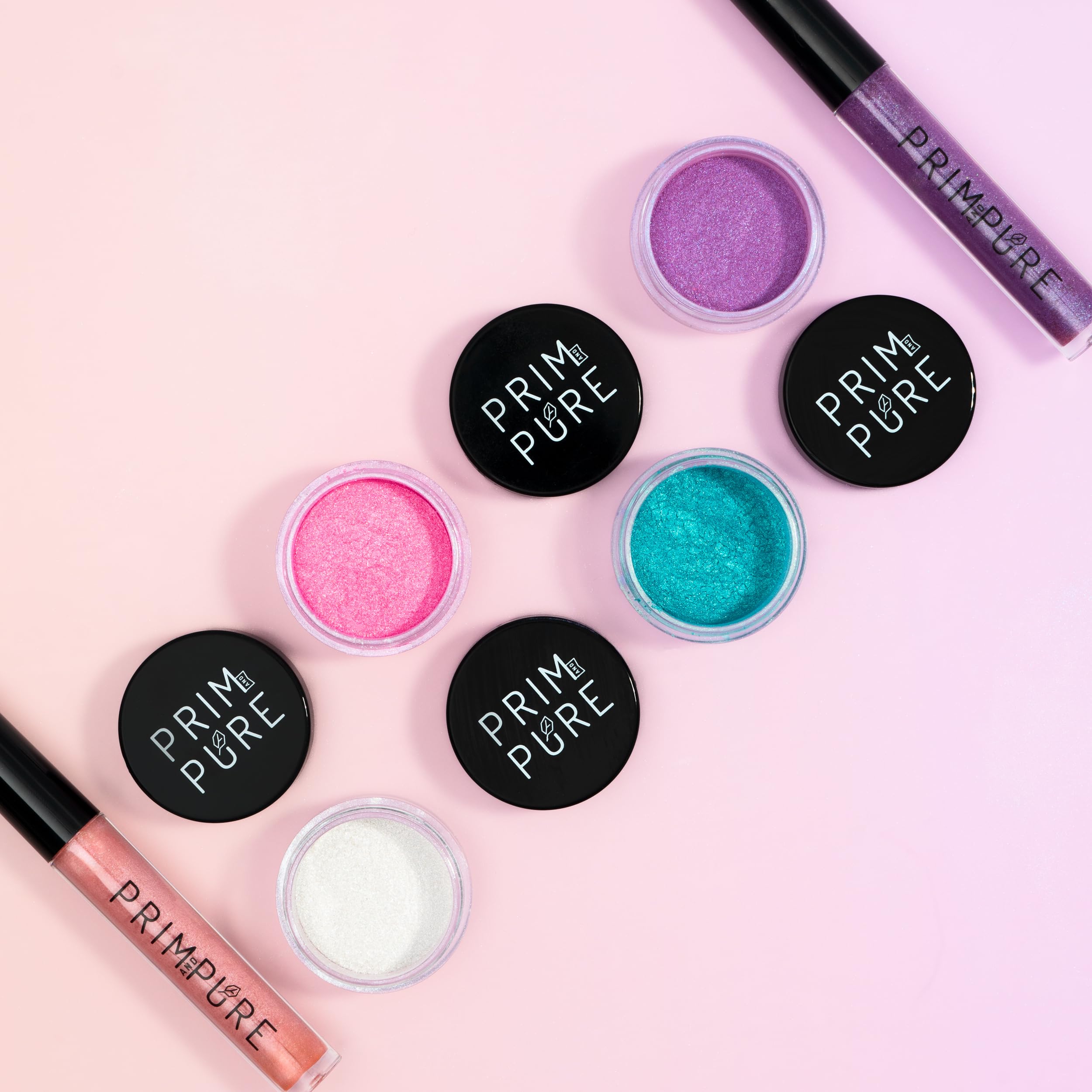 Prim and Pure sparkly lip gloss highlights safe, easy-to-apply shine for party looks.