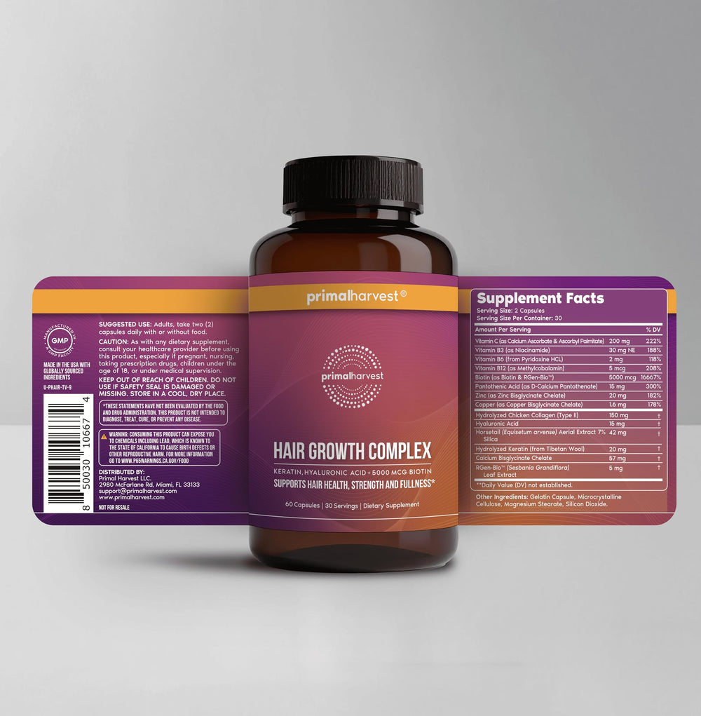Primal Harvest Hair Growth capsules close-up highlighting biotin-rich formula for hair health.