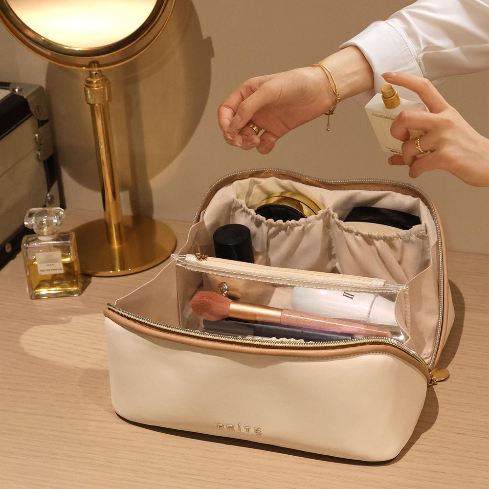 Prite makeup bag compact yet spacious for bathroom or carry-on
