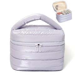 Prite Makeup Bag water-resistant fabric protects cosmetics during travel.