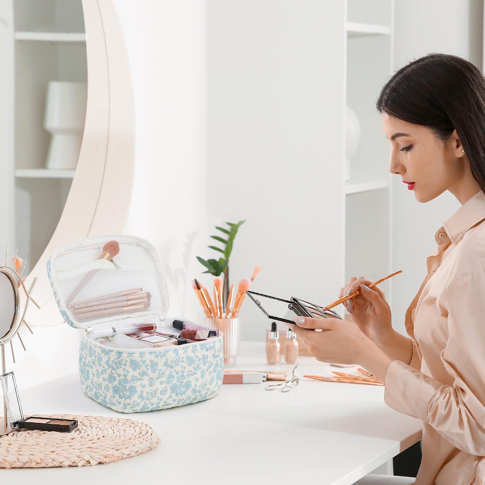 Prite travel toiletry bag open view reveals roomy interior for skincare and cosmetics.